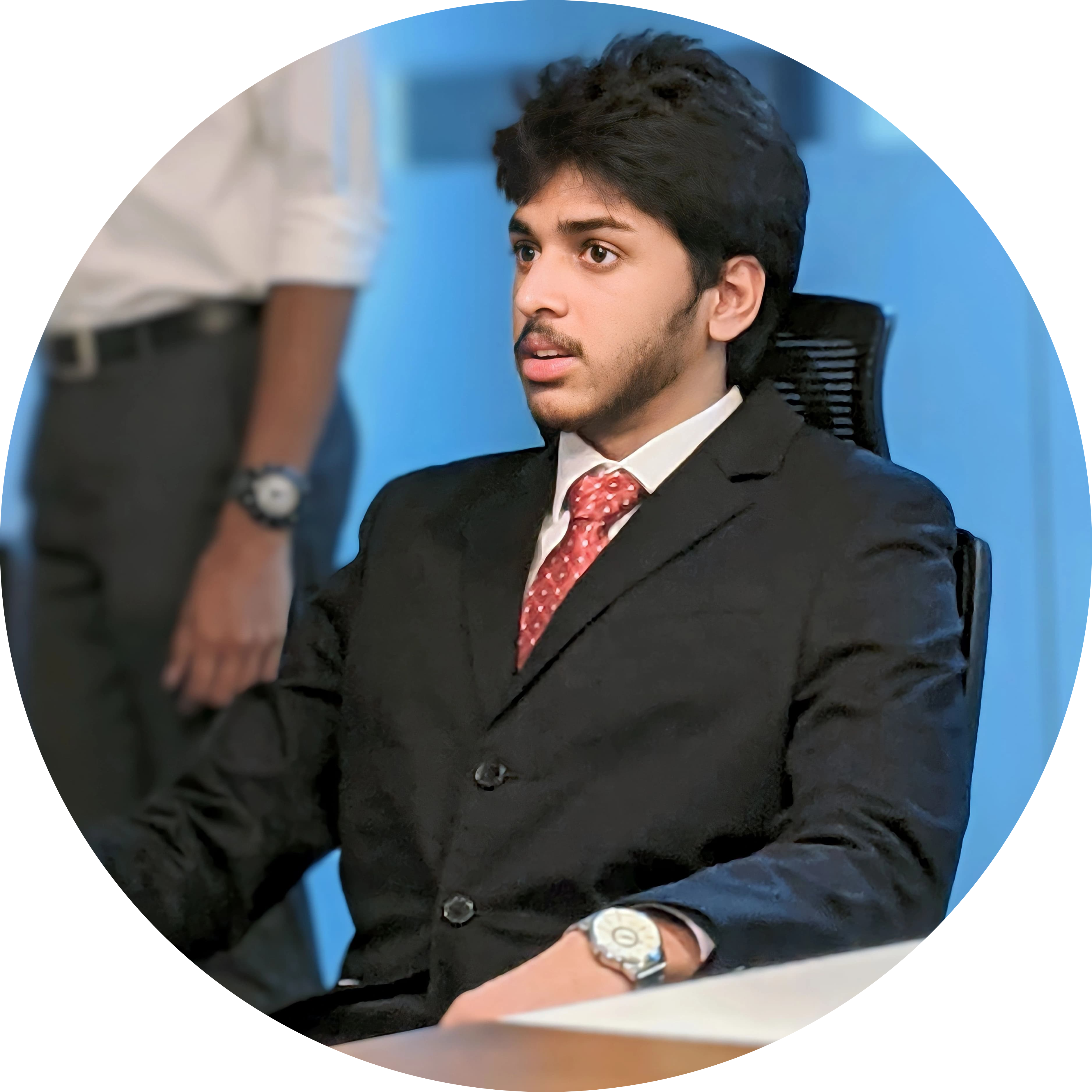 Memoji of sisila behind laptop